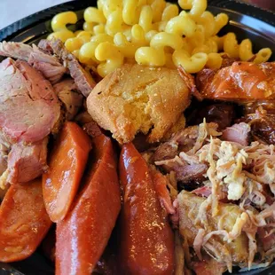 The Combo: tri tip (the best), burnt ends sausage, pulled pork, jerk chicken(too spicy for me).  Mac n cheese was not cheesy.