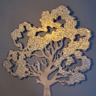 a tree with white flowers