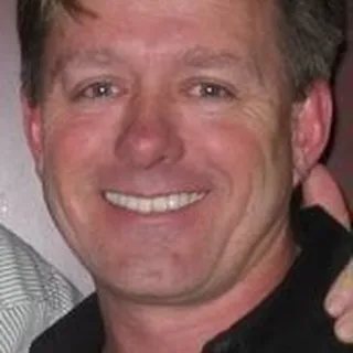 Scott T.