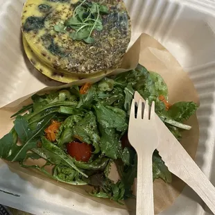 The quiche was uniquely created kind of like a double egg on English muffin.