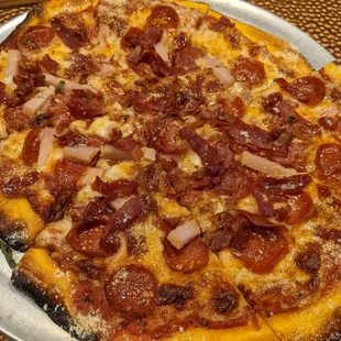 "The DeGarmo" meat-lover's pizza at Fire and Stone