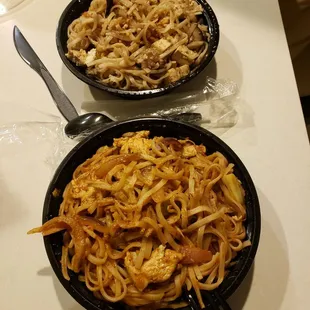 These are supposed to be Pad See Ew and Pad Thai. Ignoring the noodles which are obviously wrong, they also taste nothing like either dish.