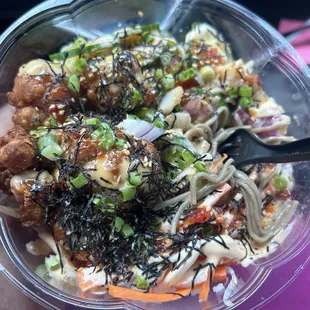 Build your own sushi bowl. It is delicious! Firecracker chicken, noodles, and more! Beware, the noodles are cold but really good.