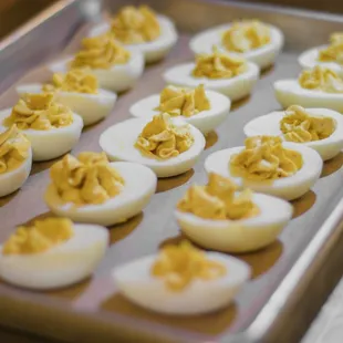 a tray of deviled eggs