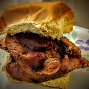 a beef sandwich on a plate