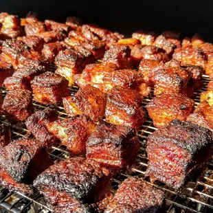 barbecued meat on a grill