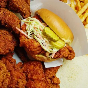 a plate of fried chicken and french fries