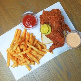 a plate of french fries and ketchup