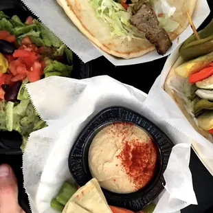 Gryro, veggie kabob, hummus plate and Greek salad.