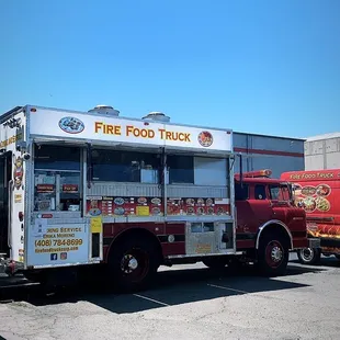 two trucks parked in a parking lot