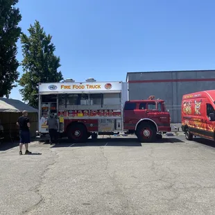 two trucks parked in a parking lot