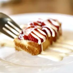 a piece of cake on a plate with a fork