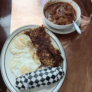 The weekend special: Green Chile Pork Stew with 2 eggs over easy, crispy hash browns and housemade tortillas + housemade salsa. $11.79