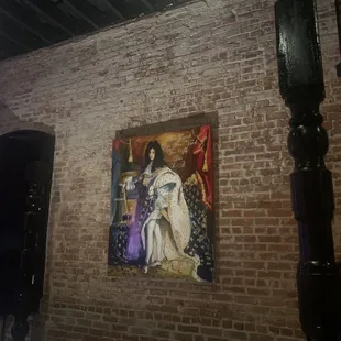 Interior royal art and exposed brick walls