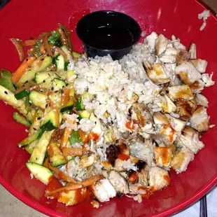 So delicious better than chipotle .. This is grilled chicken with brown rice and pineapple teriyaki with veggies !
