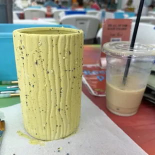 Vase with only the first layer painted. More colors were added after.
