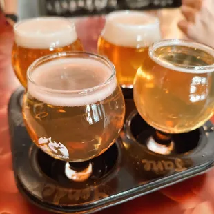 A flight of 4 of their beers, brewed on site (you can see the tanks in the tap room).