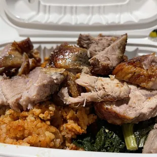 a meal in a styrofoam container