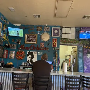 a man sitting at a bar
