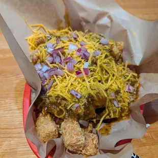 Tots loaded with green Chile