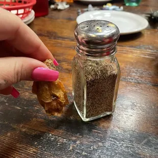 One wing, pepper shaker for scale.