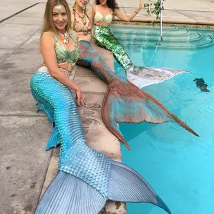 Three mermaids
