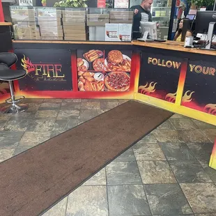 the counter area of a fast food restaurant