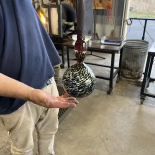 The creation of a glass bowl being shaped