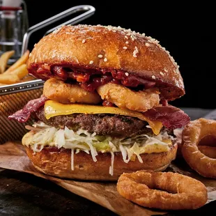 San Francisco Burger with Applewood-Smoked Bacon, Cheddar Cheese, Crispy Onion Rings, Barbeque Sauce, and Chipotle Aioli.