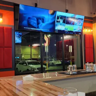 TV screens to the side