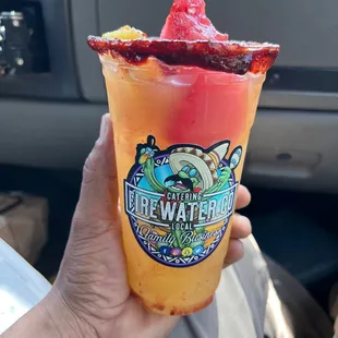 Enjoying this delicious mango loca fire water on a very hot day  go get yours to enjoy a refreshing drink
