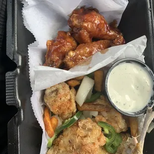 Salt and pepper wings and BBQ wings with a side of ranch.