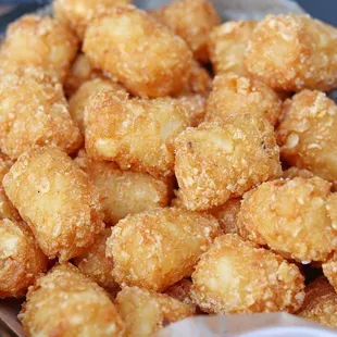 a basket of fried tater tots