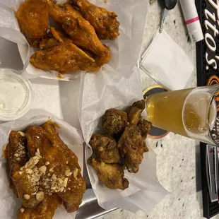 Peanut butter, Buffalo and Jamaican wings with a beer