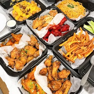 Variety of wings with chili cheese tots &amp; garlic noodles