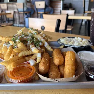 a tray of fries and dips