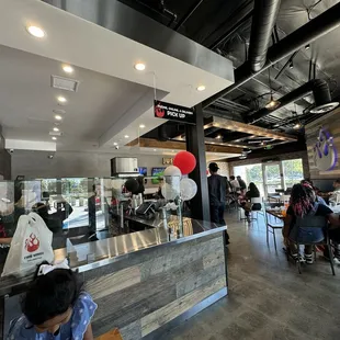 Nice inside , TVs to watch the game , lots of seats in and out
