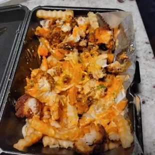 The buffalo sauce fries or whatever tf! Dry ass chicken and stale dry ass french fries!