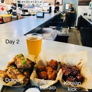 Traditional Dragon, spicy buffalo, and Korean kick with a cold Elysian beer.