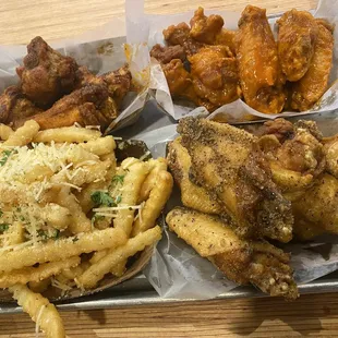Lemon pepper, Buffalo stampede, and Louisiana rub, with garlic fries