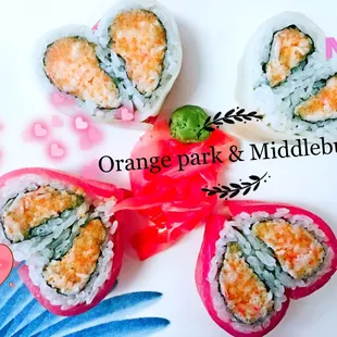 three pieces of sushi on a plate