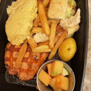 Wood Grilled Salmon* Seasoned Steak Fries Family Side Parmesan Mashed Potatoes Fresh Vegetables Fresh Fruit