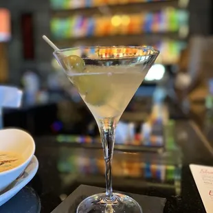 a martini on a table