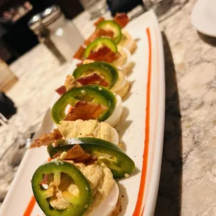 Deviled eggs with candied bacon
