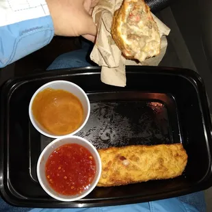 Philly cheesesteak eggrolls with hot mustard sauce and Thai chili