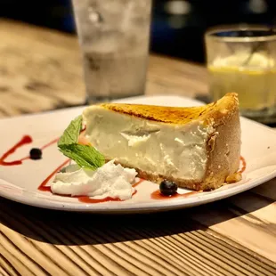 CREME BRULÉE CHEESECAKE - $8.25 Bruléed to order, fresh fruit, raspberry coulis