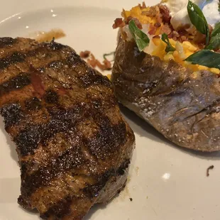 Center cut steak with loaded baked potato. Steak was a little salty but very good and it didn&apos;t need any sauce.