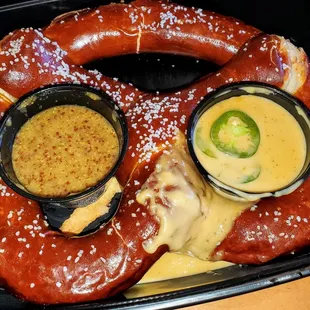 Bavarian soft pretzel w/ spicy grainy mustard, and Sam Adams beer cheese