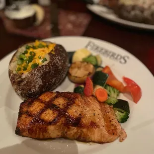 Wood Grilled Salmon with mixed vegetables and Loaded Russet Baked Potato