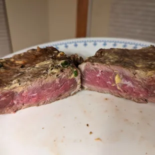 Rare aged ribeye ordered medium rare